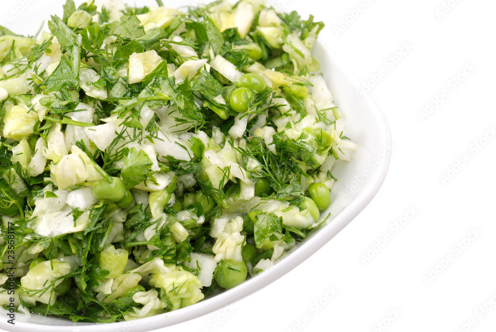 Fresh salad from vegetables and greens on a plate Fresh salad from vegetables and greens on a plate