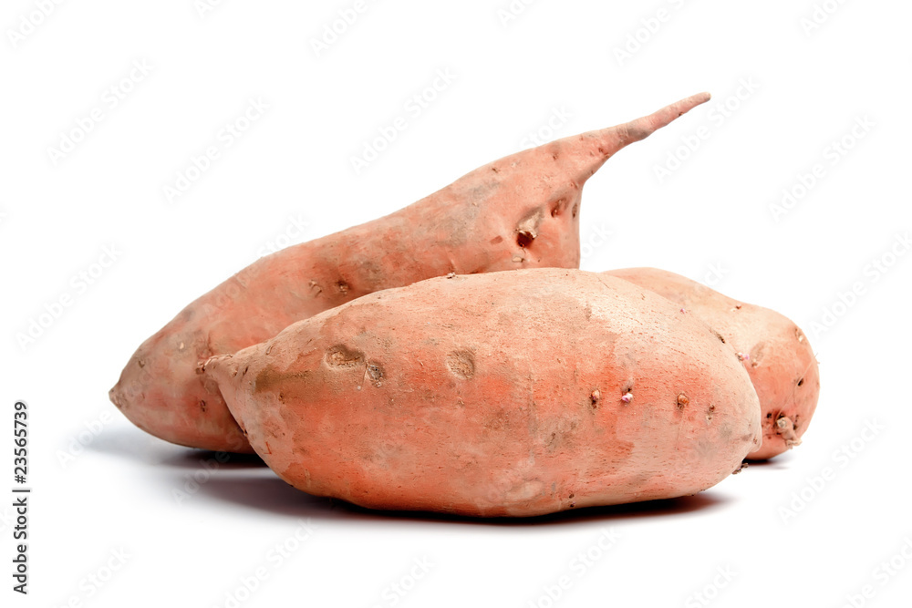 Three sweet potatoes isolated on white background Three sweet potatoes isolated on white background