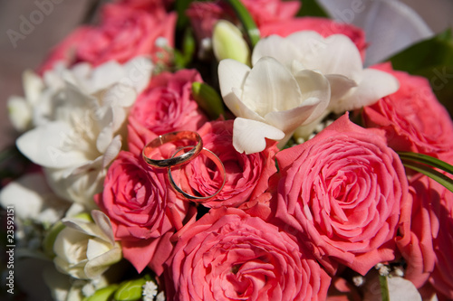 Wedding rings on a bouquet