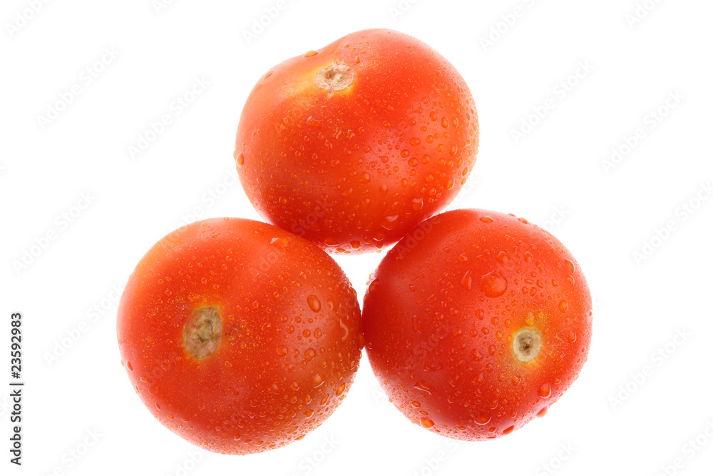 Three ripe tomatoes with dew isolated on white Three ripe tomatoes with dew isolated on white
