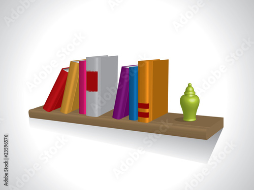 Color books with blank covers standing on the wall bookshelf