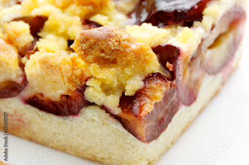 Fresh baked plum cake with pwdered sugar