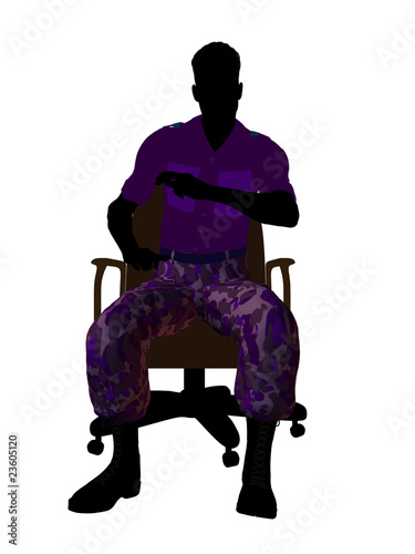 Male Soldier Sitting On An Office Chair Silhouette photo