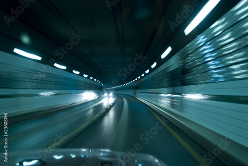 Interior of a tunnel with car coming from the opposite direction