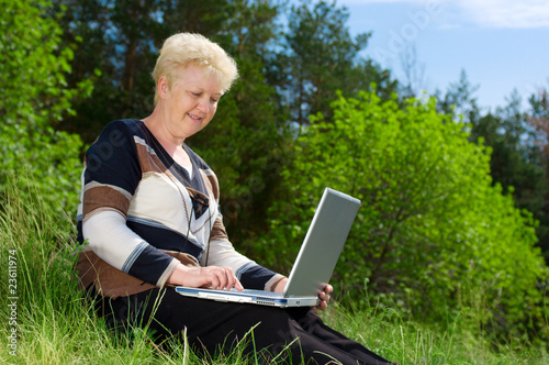 Senior woman with laptop