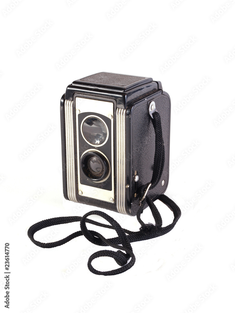 Old camera on a plain white background. Old camera on a plain white background.