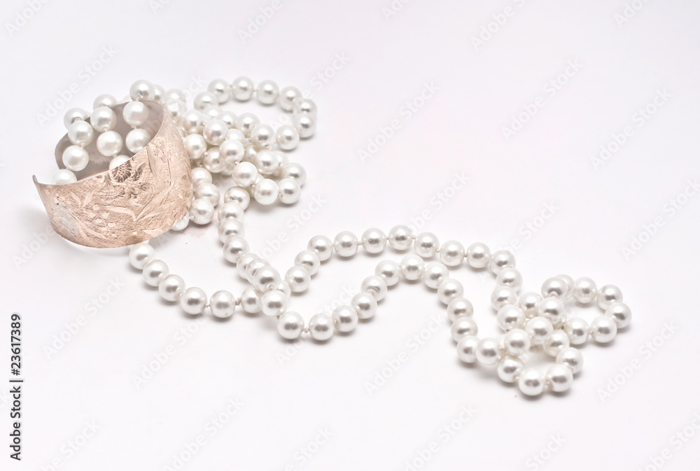 pearls and golden bracelet pearls and golden bracelet