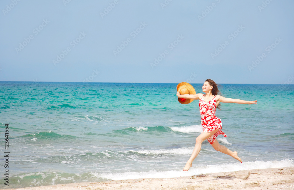 young happy girl running on beach young happy girl running on beach