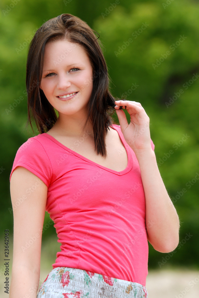 young woman wearing a pink t shirt young woman wearing a pink t shirt