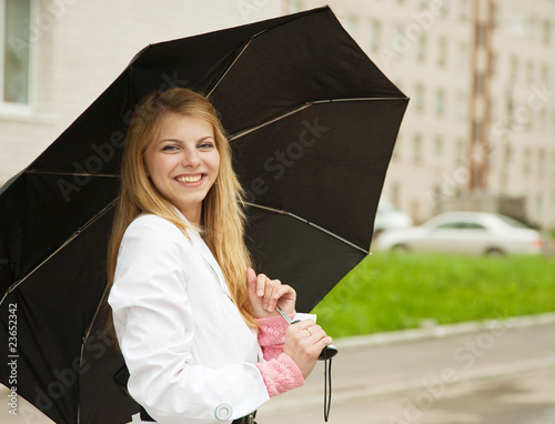 girl with umbrella outdoors photo