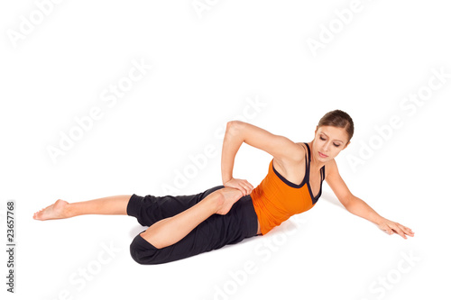Fit Attractive Woman Practicing Yoga Pose © Artur Bogacki