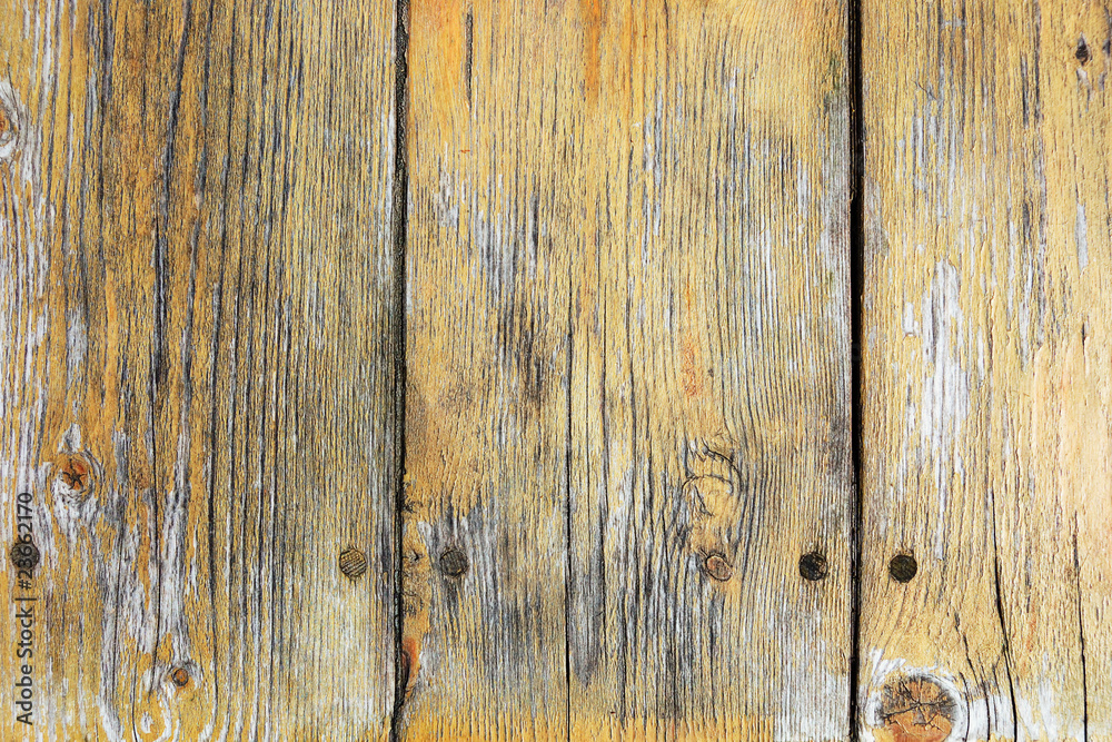 Yellow painted scratched and threadbare wooden plank texture Yellow painted scratched and threadbare wooden plank texture