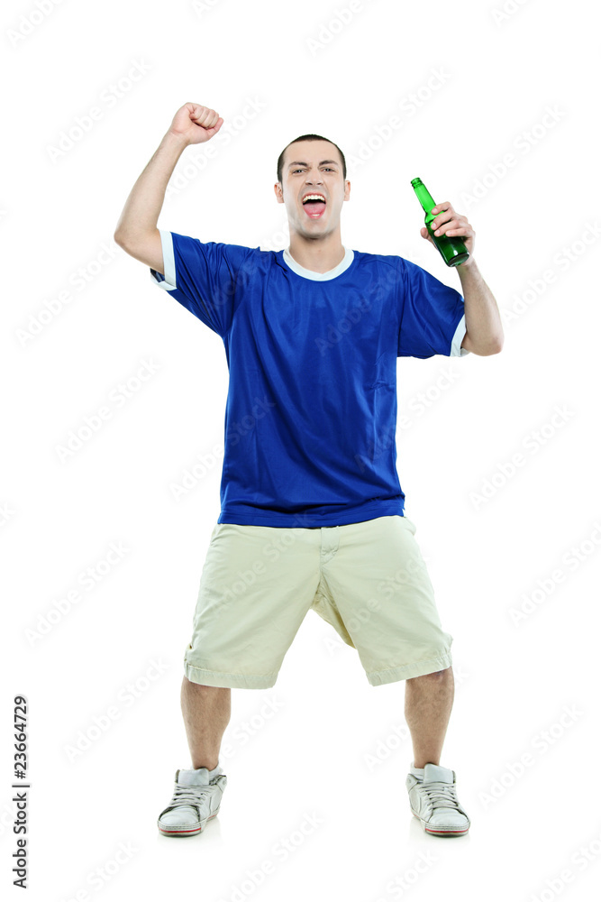 Excited football fan with a beer in his hand watching sport