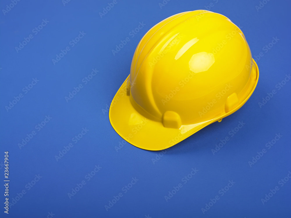 Fototapeta premium Yellow Hardhat On Blue