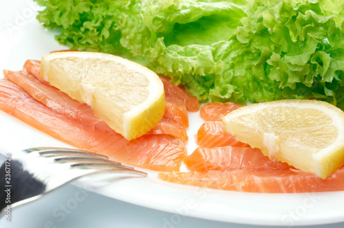 Salted salmon on white plate.