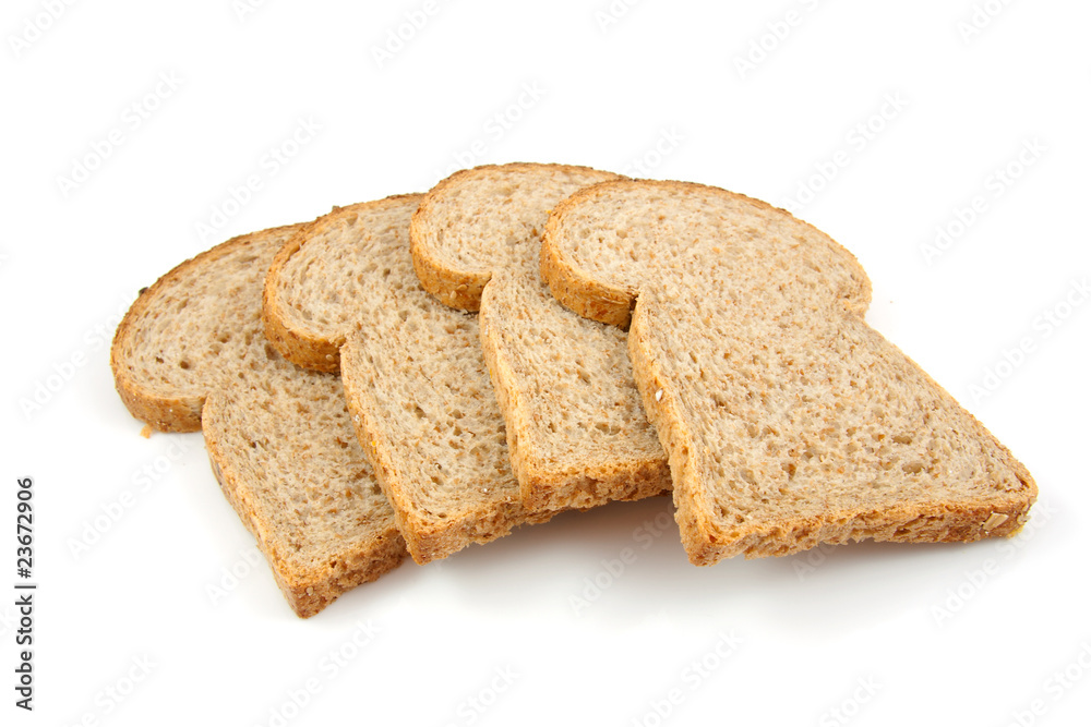 Slices brown bread over white background