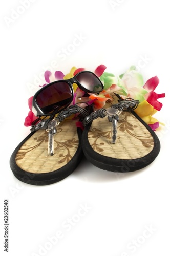 Hawaiian lei, thongs and sunglasses photo