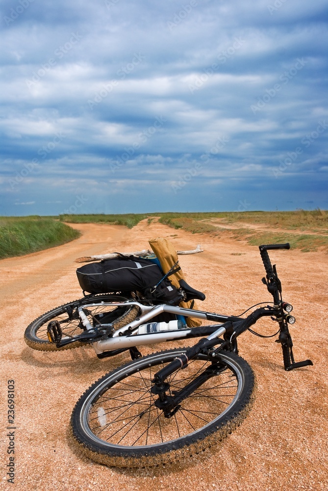 bicycle on a sandy road