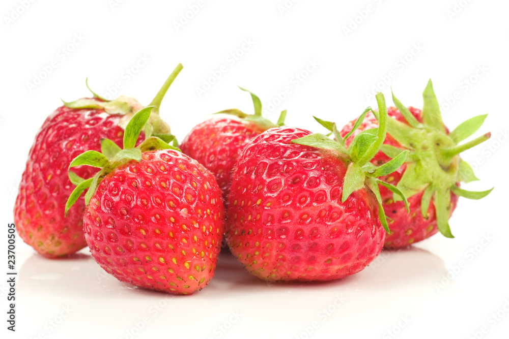 five red strawberries, isolated on white background five red strawberries, isolated on white background