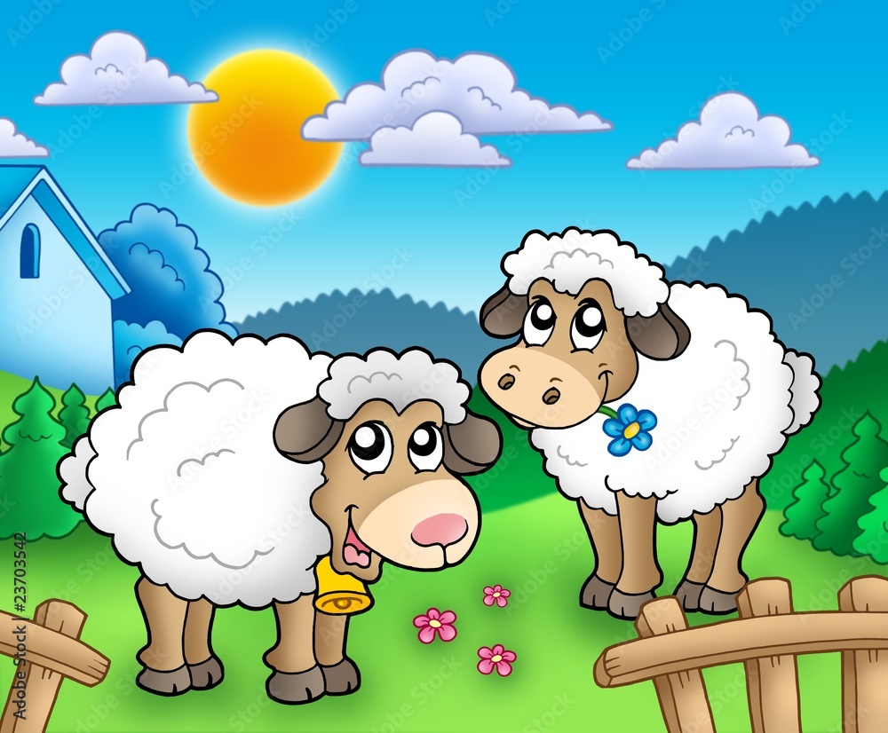 Two cute sheep behind fence Two cute sheep behind fence