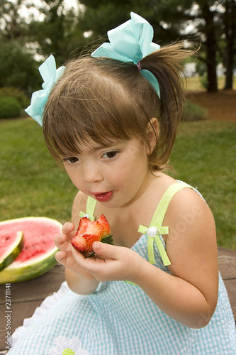 Girl Eating Strawberries