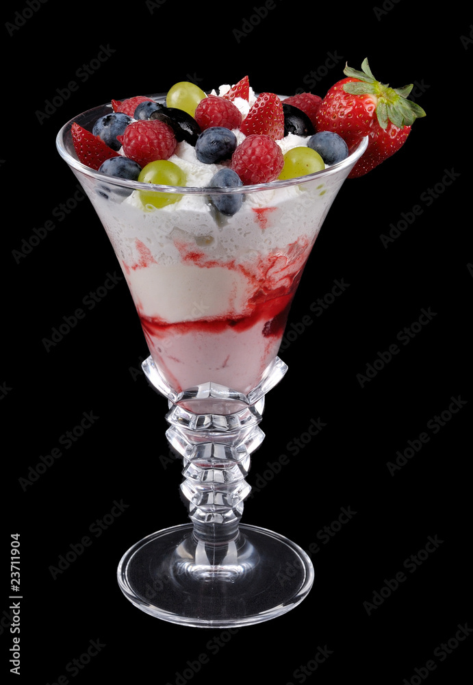 Fruit desert in wineglass on black Fruit desert in wineglass on black