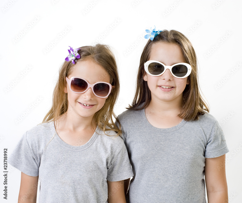 Two young girls with sunglasses Two young girls with sunglasses