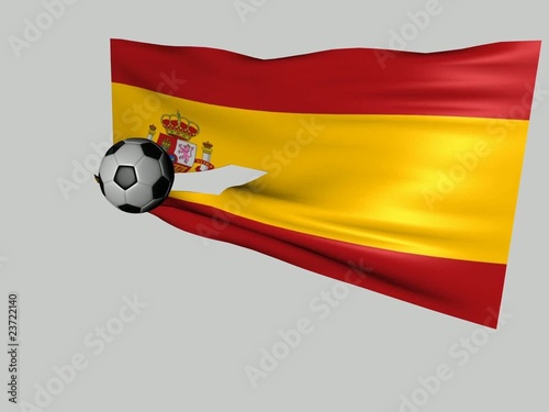 balon de futbol atravesando bandera de españa