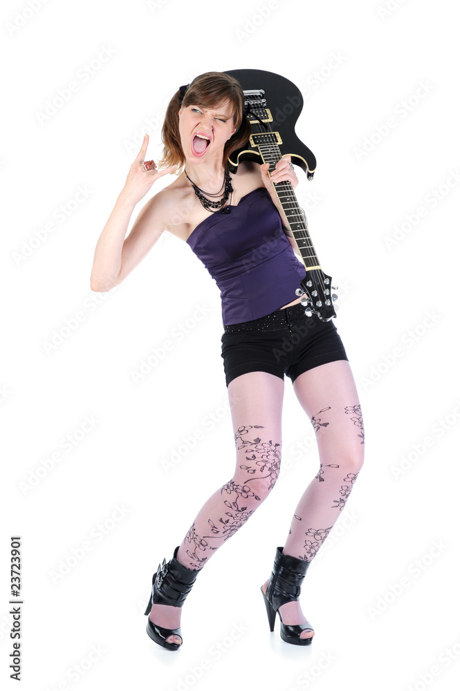 energetic girl with a black guitar in his hand. energetic girl with a black guitar in his hand.