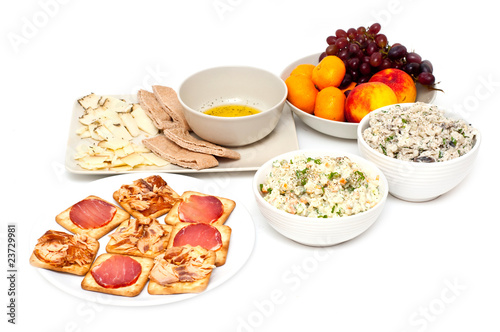 light dinner with salads, cheese, crackers and bread