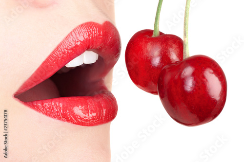 Obraz na płótnie sexy red lips with cherry isolated on white w salonie