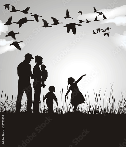 Family pursues migrating geese, black and white
