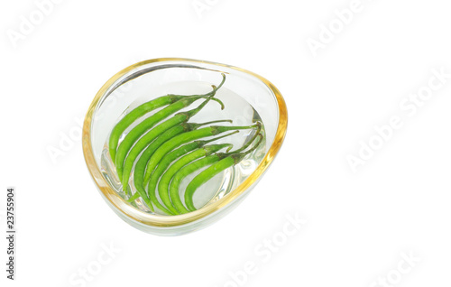 Fresh green chillies in water