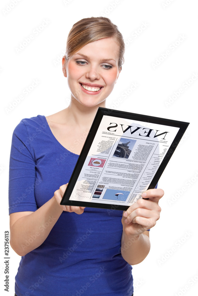 Woman holding a touchpad pc, reading a newspaper Woman holding a touchpad pc, reading a newspaper