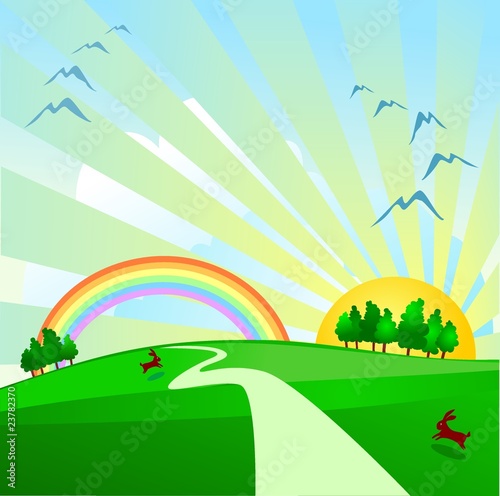 Countryside with sunrise and rainbow