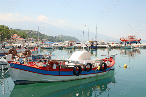 Greece - fishing boats and yacht in small marina