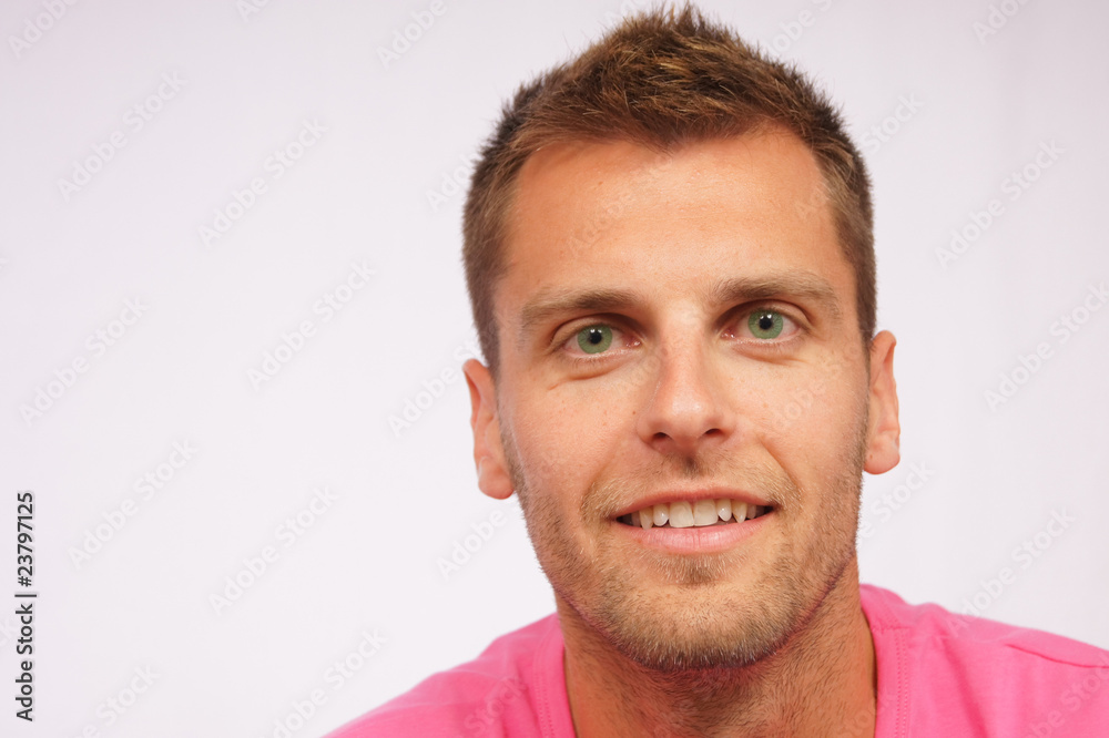 Fototapeta premium Young man with green eyes