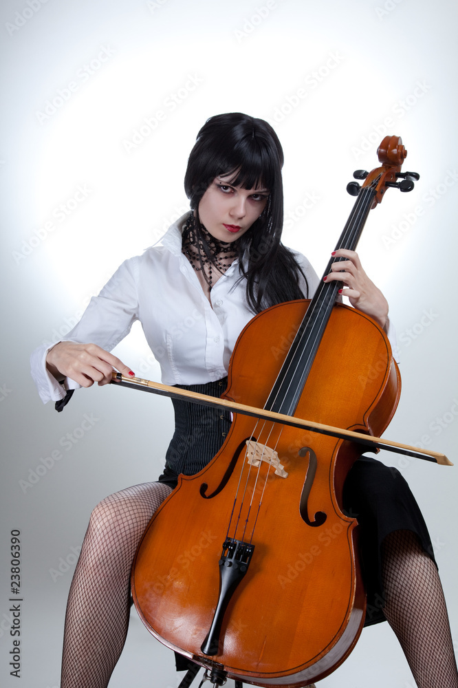 Young woman playing cello Young woman playing cello