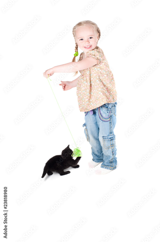 Obraz premium Little girl playing with kitten