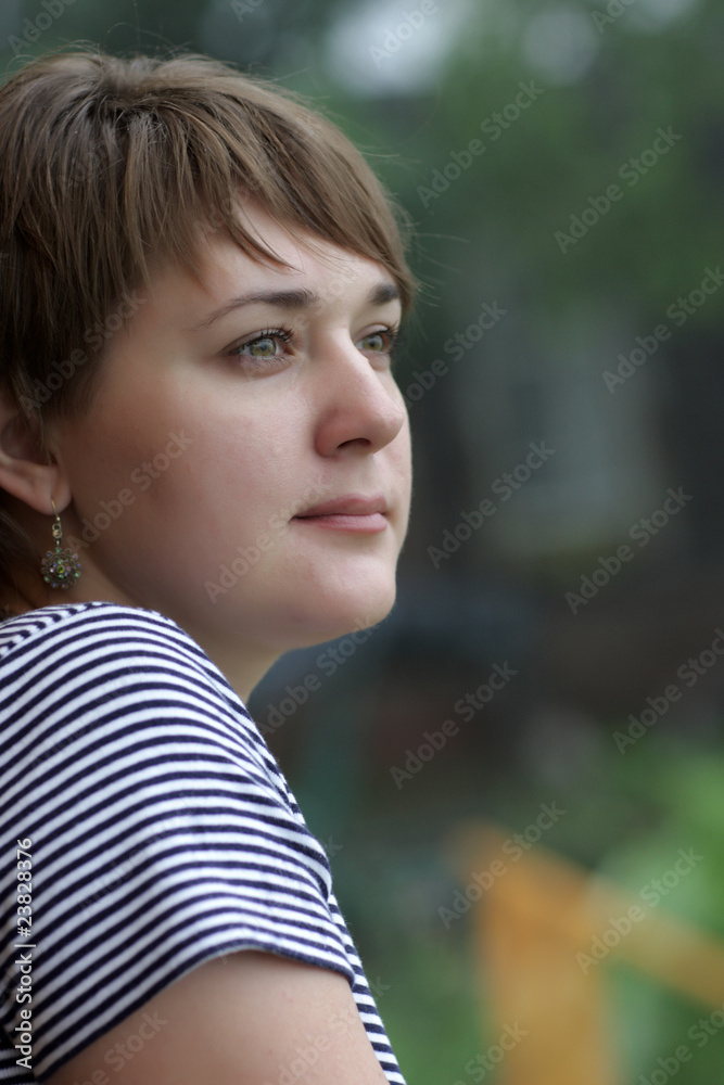 Pensive woman in park Pensive woman in park