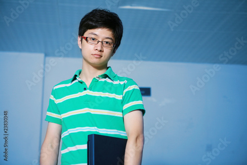 asian male student with laptop Free Download asian male student with laptop - GFXLoad
