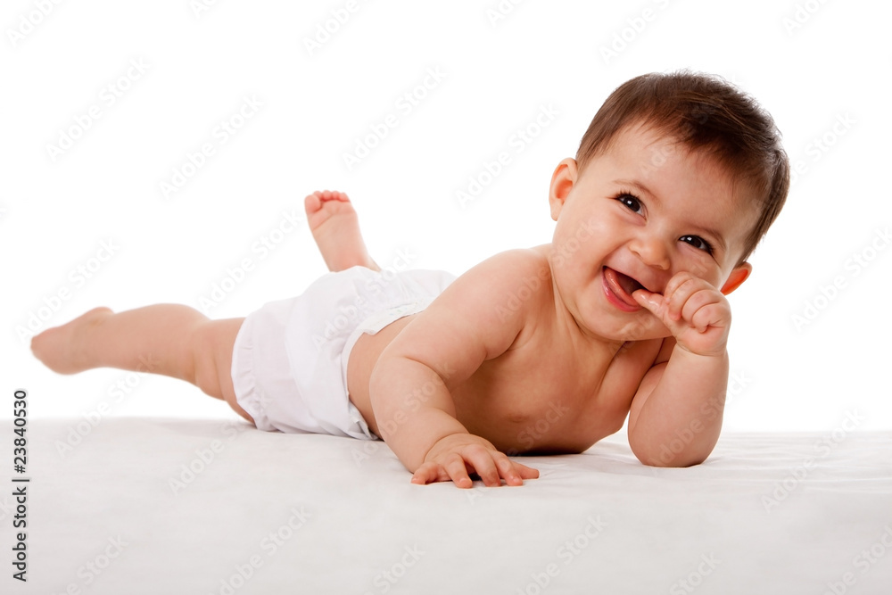 Happy baby laying on side Photos | Adobe Stock
