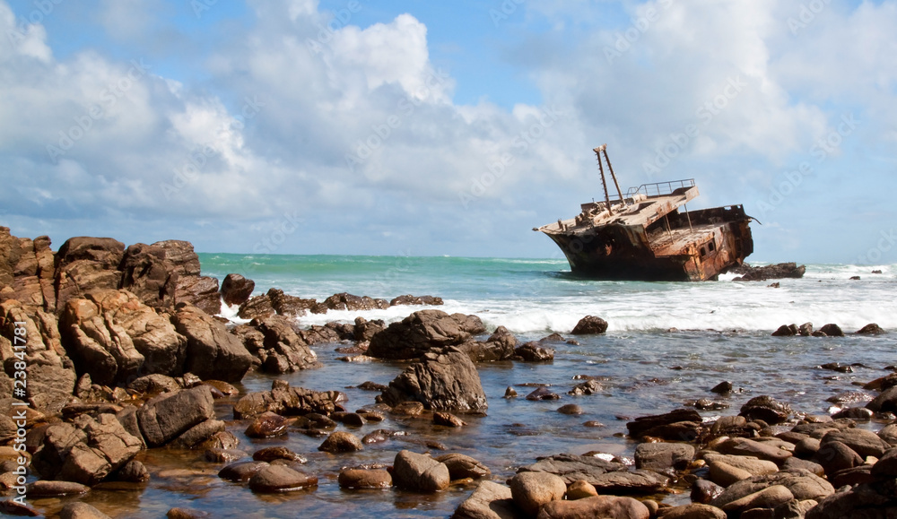 Aghullas shipwreck lying on the rocks in the breakers