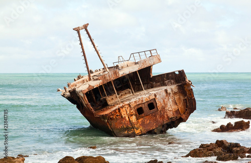 Aghullas shipwreck lying on the rocks in the breakers