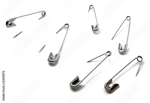 open safety pin in white background