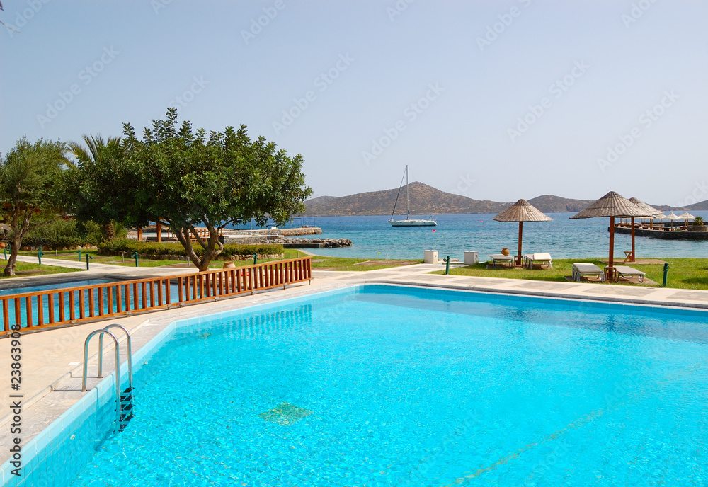 Swimming pool at the beach of luxury hotel, Crete, Greece