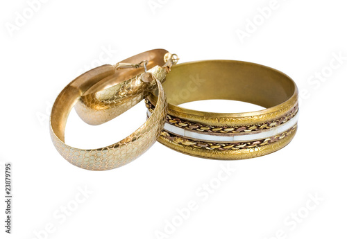 Fotografie Golden old vintage bracelet and hoop earrings