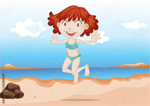 A Girl Dancing on Beach © GraphicsRF