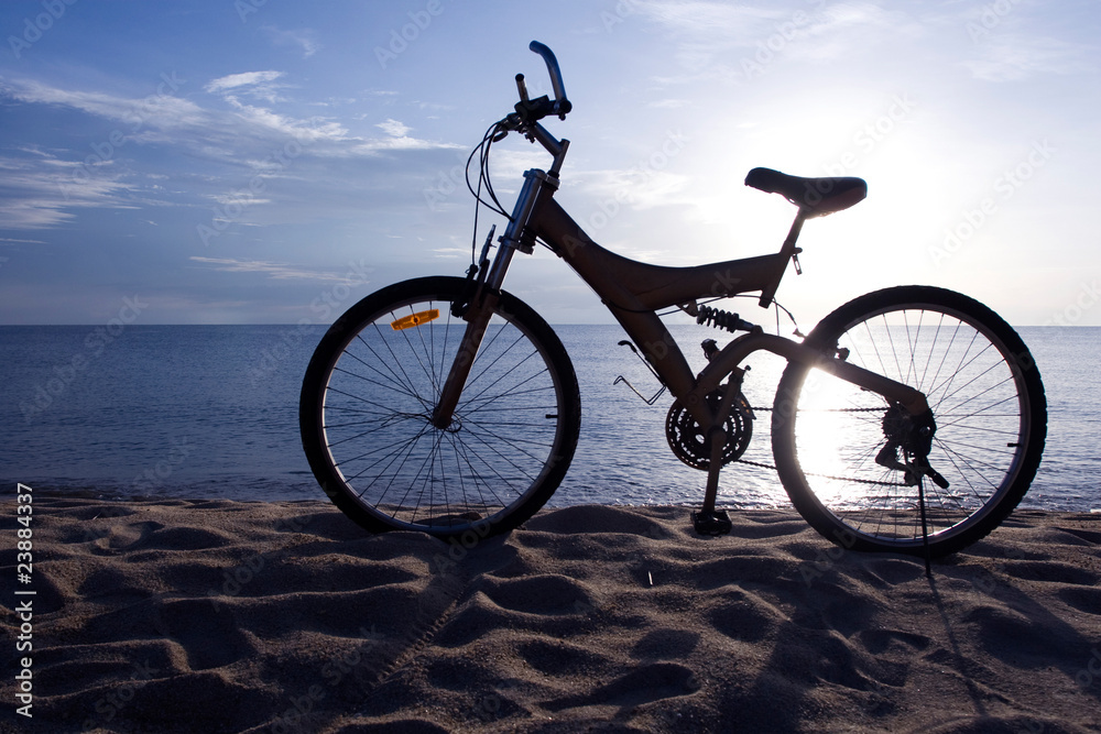 Fototapeta premium Silhouette of a Bike on the Beach