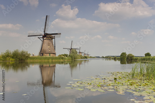 windmills on river